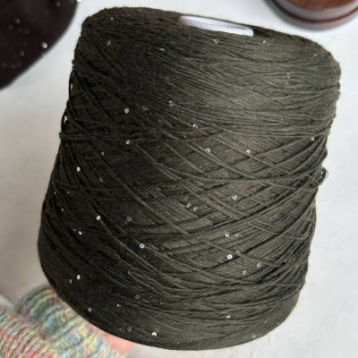 Бобина Kachinelli Merino (85% меринос, 4% хлопок, 11% пайетки), 310 м. (1112, Софт Грин)